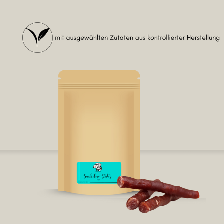 Papierbeutel gefüllt mit vegetarischen Kaustangen mit dem Hinweis "mit ausgewählten Zutaten aus kontrollierter Herstellung"