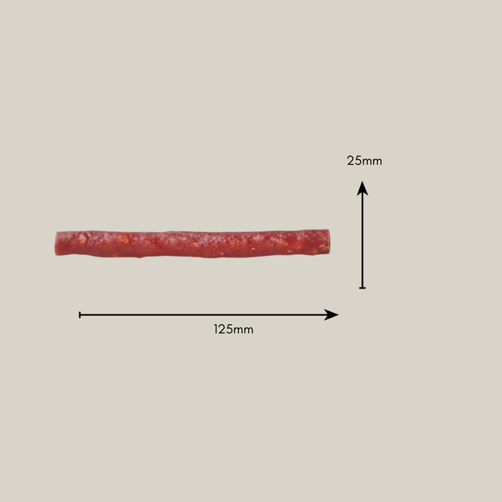 rötliche Kaustange für Hunde mit Maßangabe 25mm x 125mm